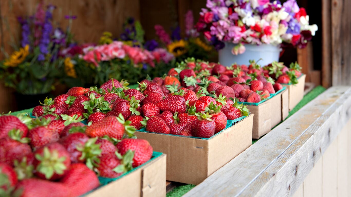 strawberries at a roadside farm stand